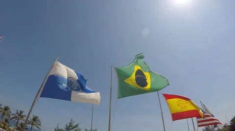 Brazil flag waving in the wind on the beach in Rio de Janeiro, Brazil Stock Footage 68507835