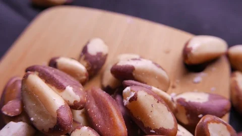 Brazil nuts. Closeup 4K UHD Stockbeeldmateriaal 73571071