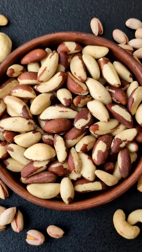 Brazil nuts, raw and shelled, are a source of selenium and a healthy food ingred 스톡 동영상 329622355