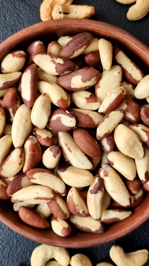 Brazil nuts, raw and shelled, are a source of selenium and a healthy food ingred 스톡 동영상 329622360