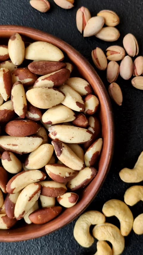 Brazil nuts, raw and shelled, are a source of selenium and a healthy food ingred 스톡 동영상 329622368