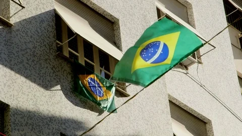 Brazil street flags flapping in the wind and sun on street 스톡 동영상 93108259