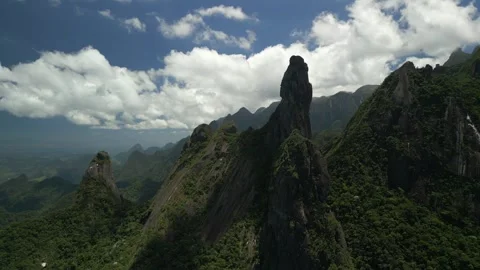 Brazil, Teresópolis. Dedo de Deus rock formation. Wide aerial orbit on partly Stock Footage 342326822