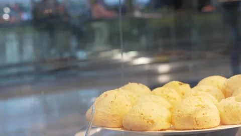 Brazilian cheese bread are displayed at an airport terminal Stock Footage 303664657