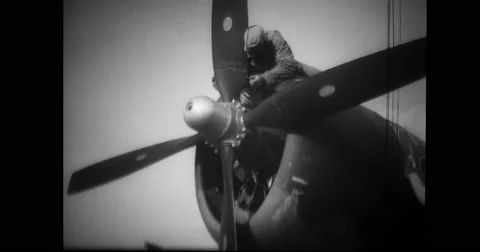 Brazilian engineer servicing propeller of fighter plane Stock Footage 43502688