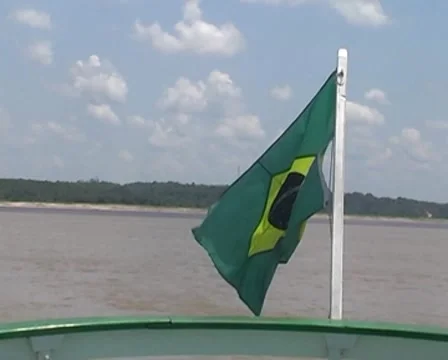 Brazilian flag at Amazon River Stock Footage 10571562