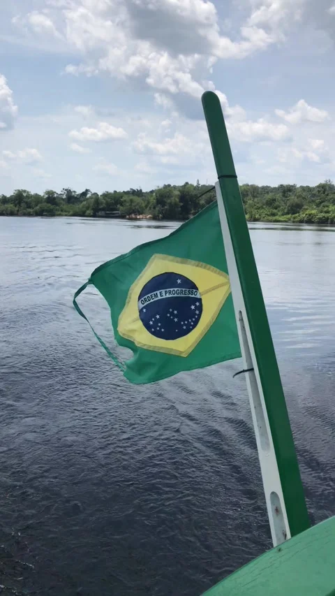 Brazilian Flag Waving on the River Видео 296448978