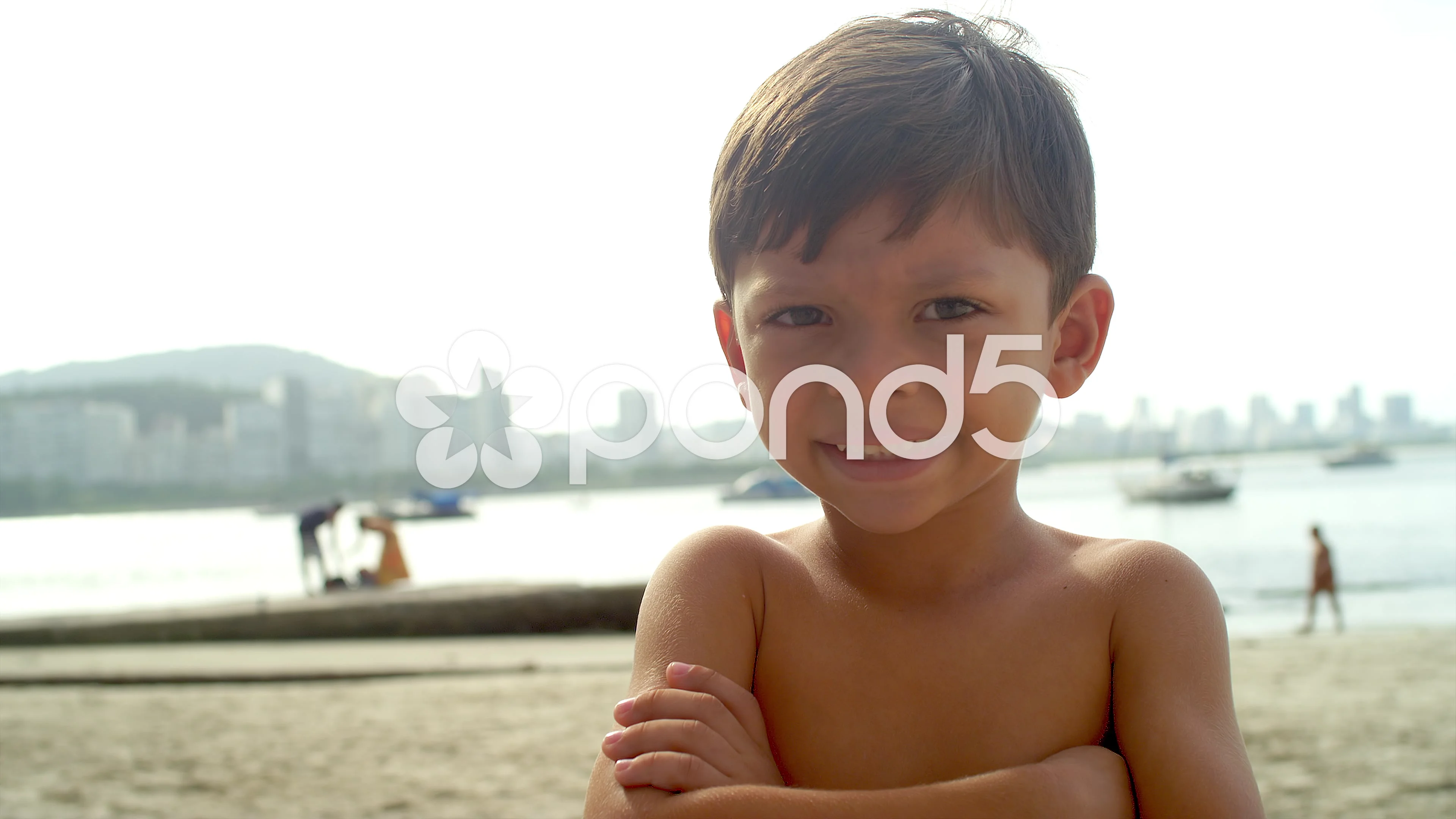 Brazilian kid smiles on a beach in Brazi, Stock Video