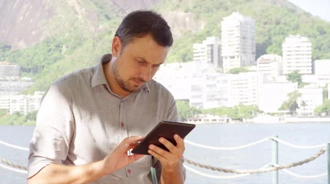 Brazilian man using technology Stock Footage 49319303