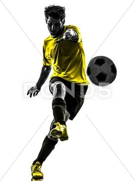 Brazilian soccer football player young man kicking silhouette Stock Photos