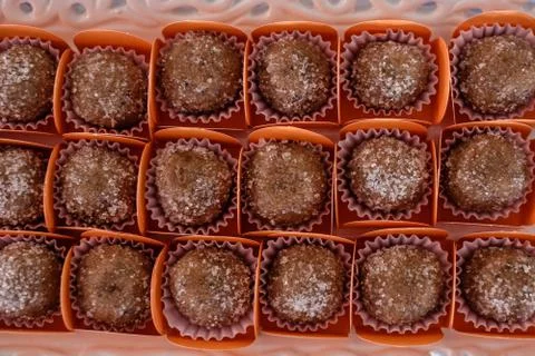 Brazilian sweets called brigadeiro, distributed on party table to be consumed Stock Photos