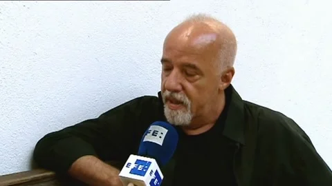 Brazilian writer Paulo Coelho turns 75 y, Stock Video