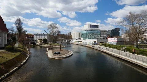 Brda river with the new opera building in the background. Bydgoszcz, Poland. Stock Footage 335215204