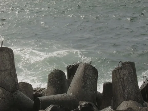 Breackwater and big waves Stock Footage 80672371