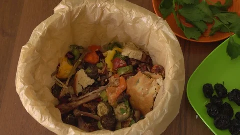Bread and bakery being thrown away uneaten in home Stock Footage 122120097