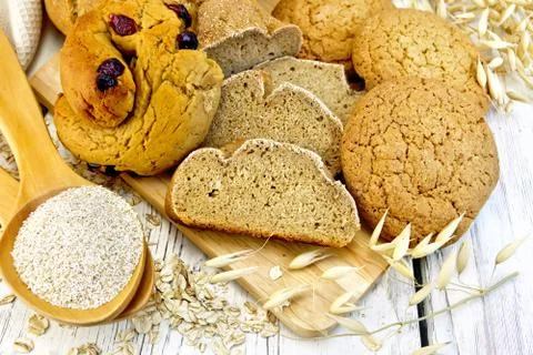 Bread and biscuits oat with bran on board Stock Photos