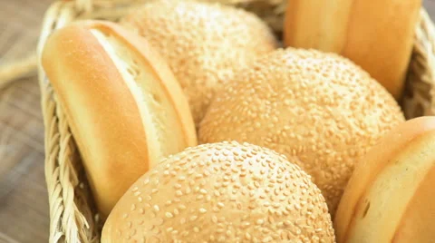 Bread and buns in baskets on shelf in bakery Stock Footage 64768748