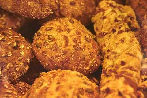 Bread and buns covered with large grains Stock Photos