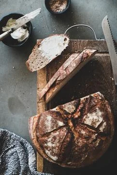 Bread and butter breakfast or snack over grey concrete background Stock Photos