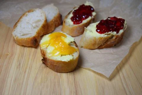 Bread and butter with jam Stock Photos