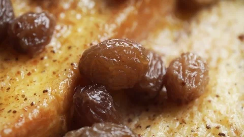 Bread and butter pudding rotating extreme close up stock footage Video stock 99451850