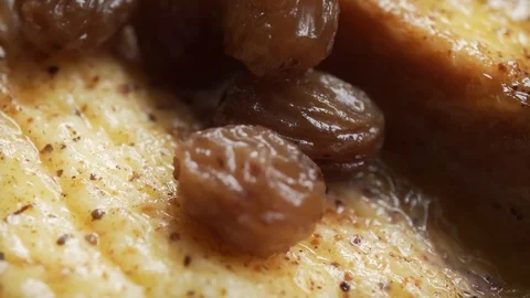 Bread and butter pudding rotating extreme close up stock footage Video stock 99452705