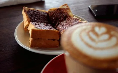 Bread and coffee Stock Photos