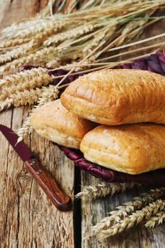 Bread and ears of wheat Stock Photos