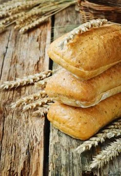 Bread and ears of wheat Stock Photos
