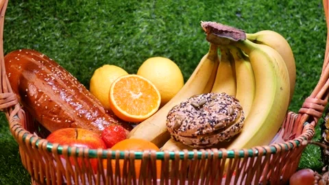 Bread and fruit on the grass Stock-Footage 346984637
