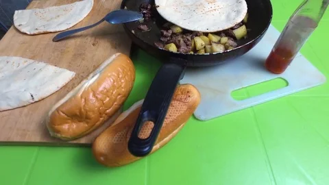 Bread and frying pan on the table. Sandwiches Stock Footage 81679655