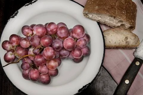 Bread and grapes Stock Photos