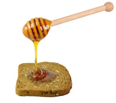 Bread and honey Stock Photos