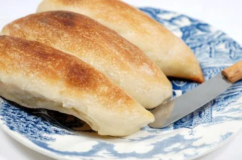 Bread and knife Stock Photos