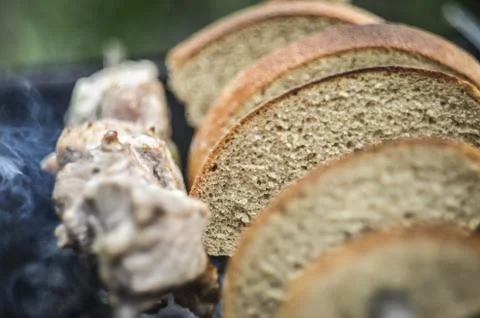Bread and meat at BBQ Stock Photos