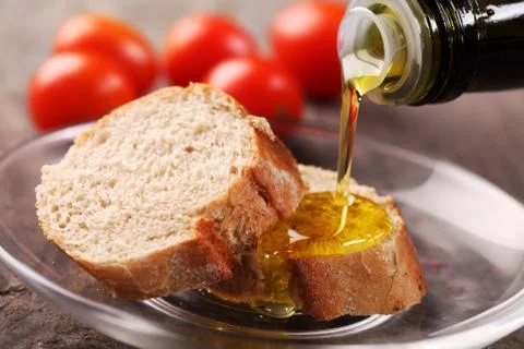 Bread and oil Stock Photos