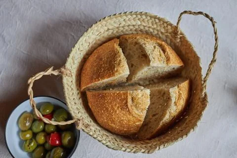 Bread and olives on the table in a restaurant in Catalonia Stock Photos