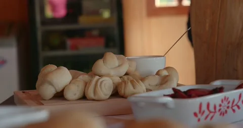 Bread and pinions in a table. Natural light.4k Stock-Footage 140340189