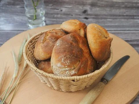 Bread and rolls fresh from the bakery, served warm. Stock Photos
