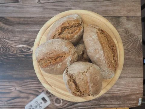 Bread and rolls fresh from the bakery, served warm. Stock Photos