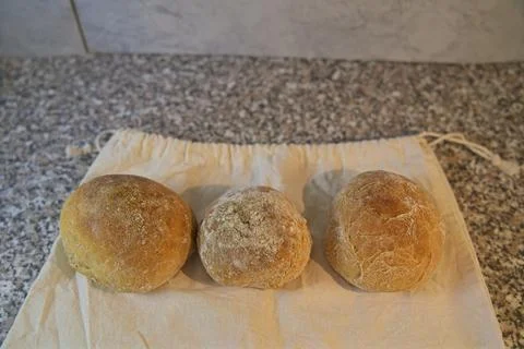 Bread and rolls fresh from the bakery, served warm. Stock Photos
