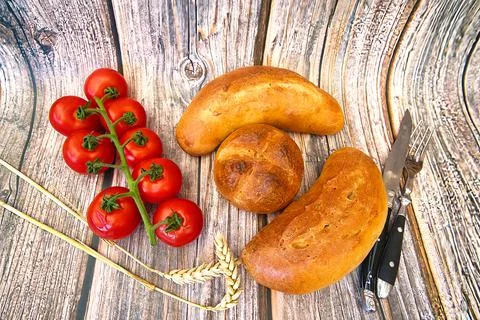 Bread and rolls fresh from the bakery, served warm. Stock Photos