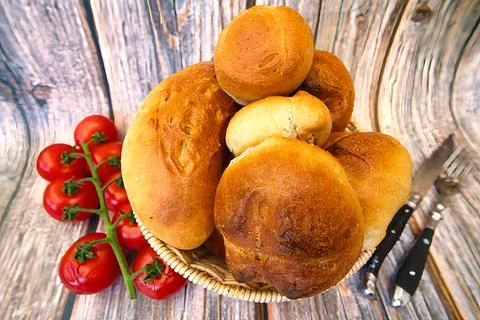Bread and rolls fresh from the bakery, served warm. Stock Photos