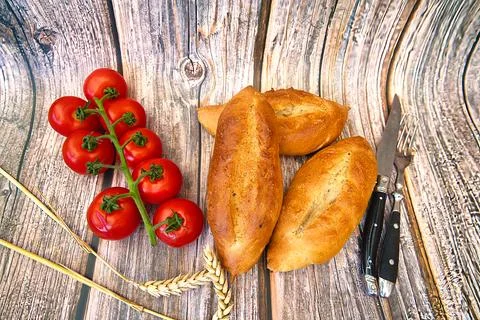 Bread and rolls fresh from the bakery, served warm. Stock Photos