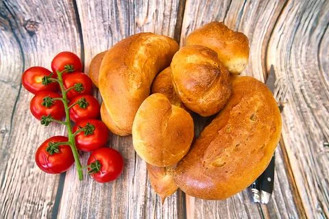 Bread and rolls fresh from the bakery, served warm. Stock Photos