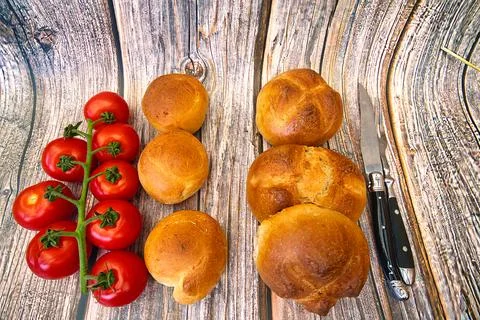 Bread and rolls fresh from the bakery, served warm. Stock Photos