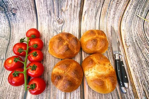 Bread and rolls fresh from the bakery, served warm. Stock Photos