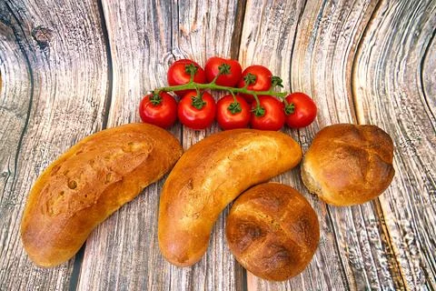 Bread and rolls fresh from the bakery, served warm. Stock Photos