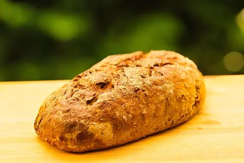 Bread and rolls fresh from the bakery, served warm. Stock Photos