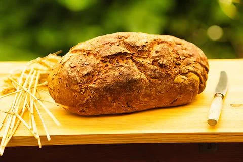 Bread and rolls fresh from the bakery, served warm. Stock Photos
